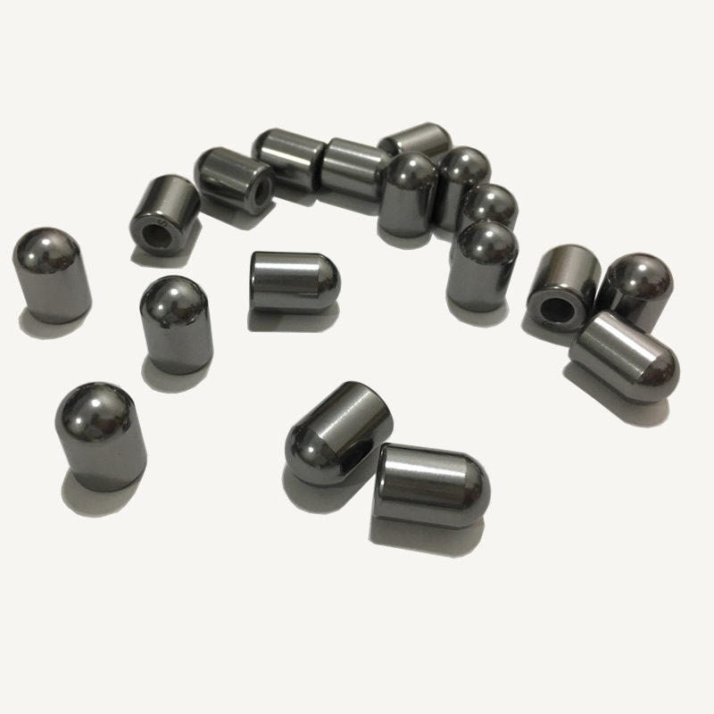 Tungsten carbide buttons for DTH drill bits