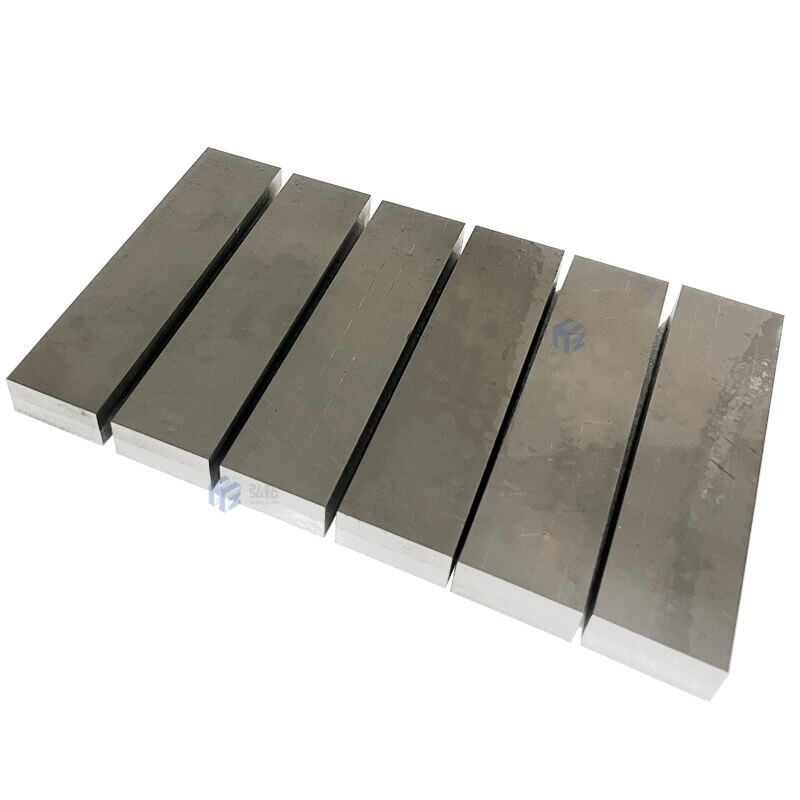 Cemented carbide tips brazed wear resistant plate.